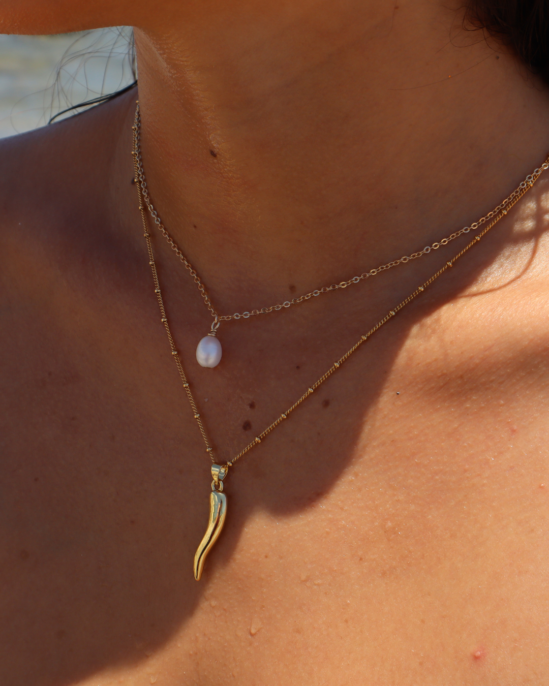Handmade Staple Pearl Necklace with a single freshwater pearl on a gold-plated chain with gold-filled findings. Simple, dainty, and perfect for everyday wear.