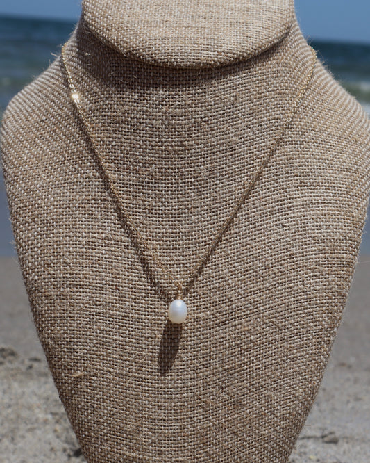 Handmade Staple Pearl Necklace with a single freshwater pearl on a gold-plated chain with gold-filled findings. Simple, dainty, and perfect for everyday wear.