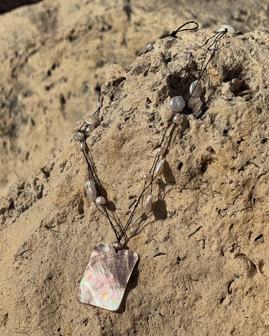 Handmade Selene Necklace with black lace wire and freshwater pearls featuring a rectangular mother of pearl pendant.