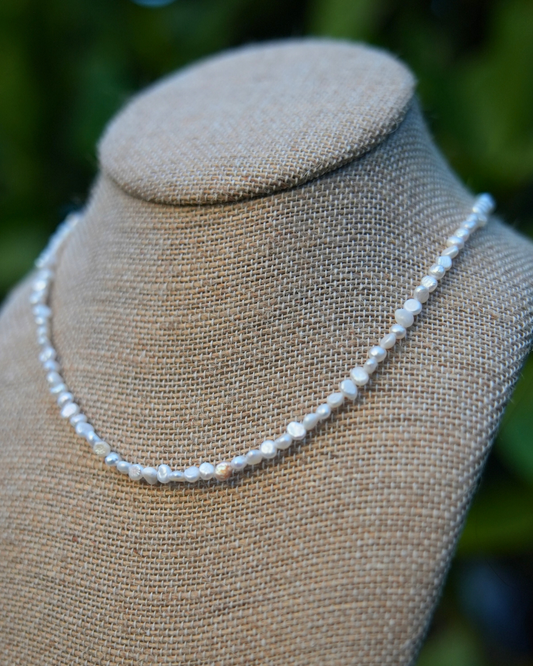 Handmade Pearl Choker featuring 4mm freshwater pearls on gold-filled findings, 14-inch necklace with 2-inch extender, unique and dainty.