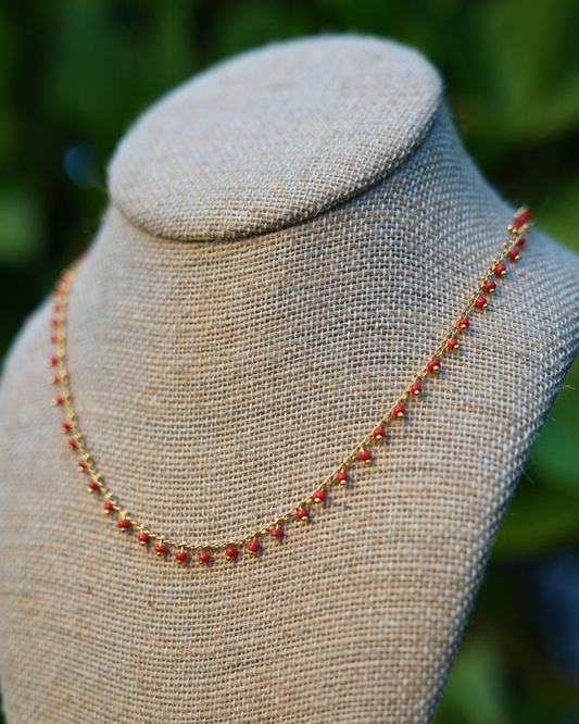 Handmade Ember Choker Necklace featuring tiny red beads on a 15-inch gold-plated chain with gold-filled findings, dainty and lightweight.